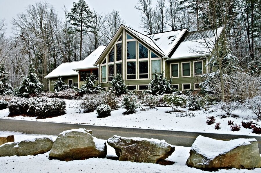 A snowy home exterior.