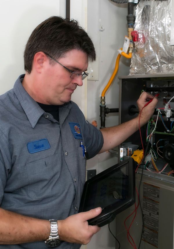 technician holding tablet, Bob's Heating & AC